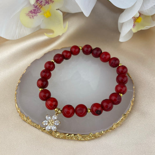Coral bracelet with decorative pendant (coral tinted)